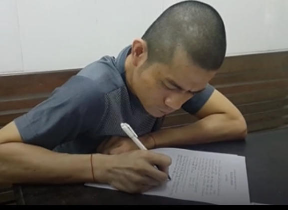 Lê Ngọc Sơn tại cơ quan điều tra.