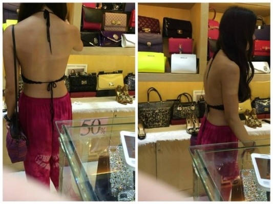Ngay cả giữa chốn đông người như siêu thị, cô gái này cũng không ngần ngại diện áo khoe lưng trần khi đi mua sắm. Ảnh: Internet.