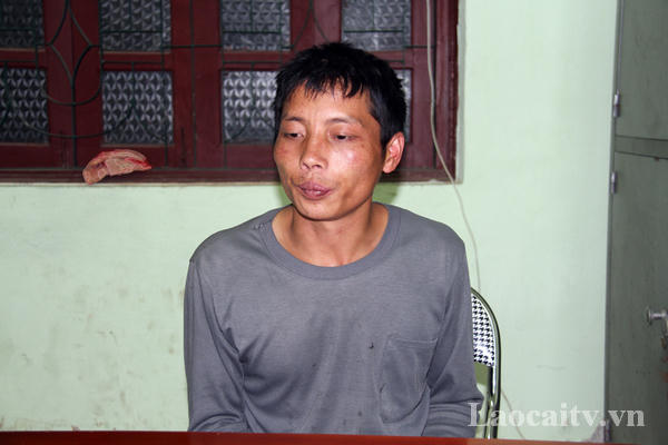Đối tượng Giàng A Giả tại cơ quan cảnh sát điều tra. (Ảnh: Truyền hình Lào Cai)