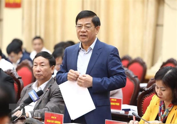Trung tướng Đoàn Duy Khương, Giám đốc Công an Thành phố Hà Nội tham luận tại hội nghị. (Ảnh: Văn Điệp/TTXVN)