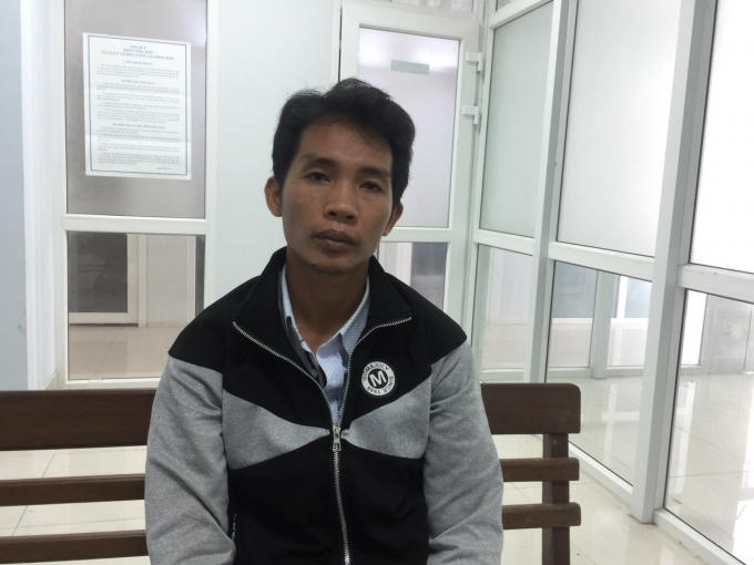 Nghi can Mang Hải tại trụ sở công an.