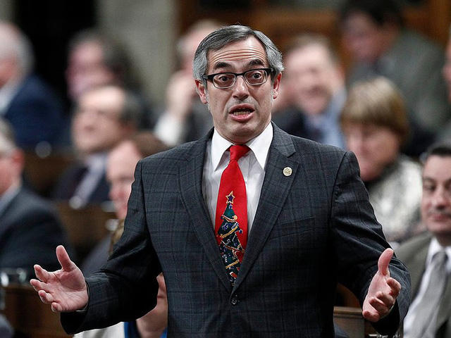 Ông Tony Clement trong một lần phát biểu tại Hạ viện Canada. Ảnh: REUTERS