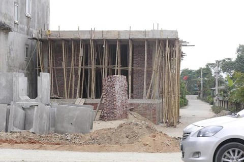 Căn nhà có thiết kế 3 tầng được ông Trần Sỹ Quang - Bí thư xã Cổ Đạm xây cho con trai đang lao động tại Hàn Quốc.