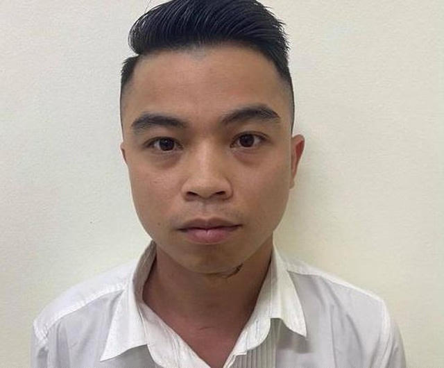 Đối tượng Cù Ngọc Hà tại cơ quan Công an. - Ảnh:NLĐ