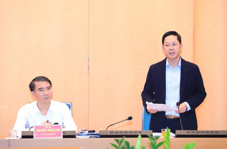 Giám đốc Sở Tài chính Hà Nội Nguyễn Ngọc Tú báo cáo tại Hội nghị. Ảnh: Lê Hải.