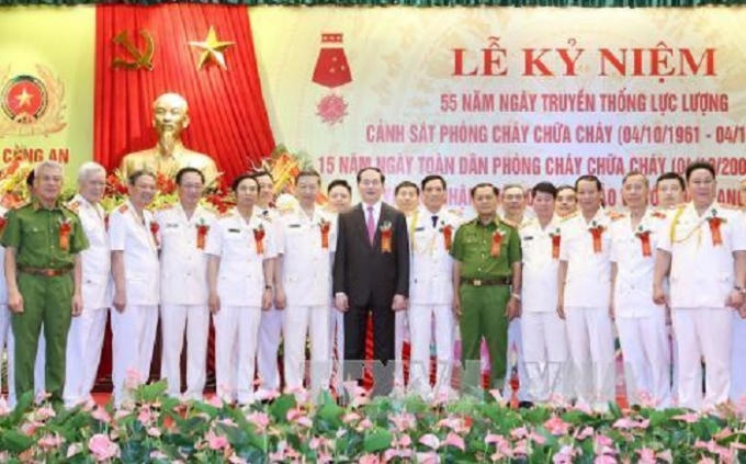 Chủ tịch nước Trần Đại Quang với các đại biểu tại Lễ kỷ niệm. Ảnh: Nhan Sáng/TTXVN.