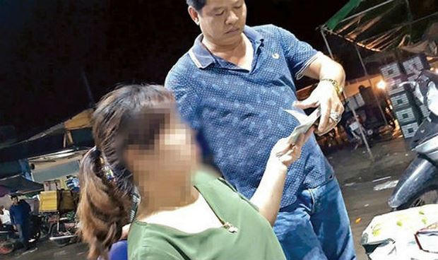 Nạn bảo k&ecirc; tại chợ Long Bi&ecirc;n.