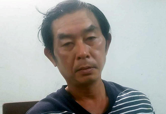 Hùng tại cơ quan công an.