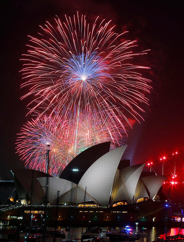 Màn trình diễn pháo hoa sớm tại cảng Sydney, Australia (Ảnh: Reuters)