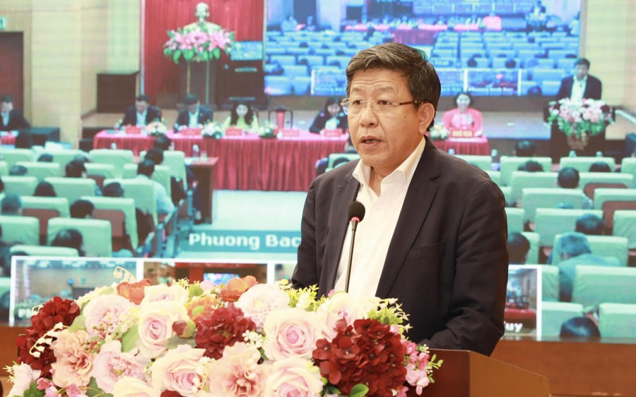 Phó Chủ tịch Thường trực UBND Thành phố Dương Đức Tuấn trình bày Chương trình hành động tại Hội nghị.