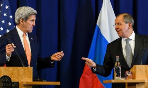 Ngoại trưởng Mỹ John Kerry (trái) và người đồng cấp Nga Sergei Lavrov trong một cuộc họp báo chung ở Geneva. (Ảnh: AFP.)