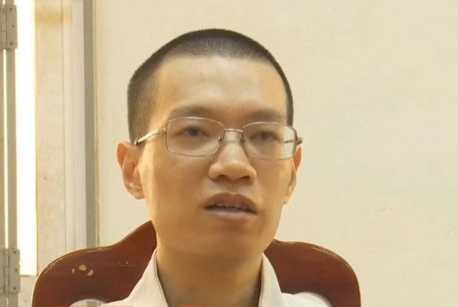 Nghi phạm Nguyễn Anh Tú tại cơ quan công an. Ảnh cắt từ clip truyền hình ANTV.