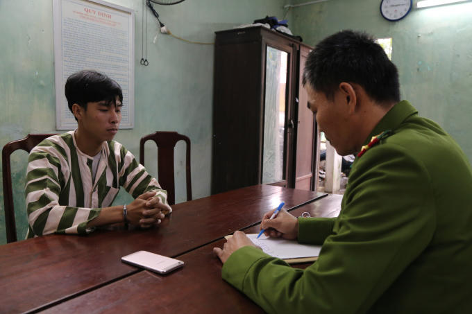 Đoàn Quốc Dĩnh tại cơ quan Công an.