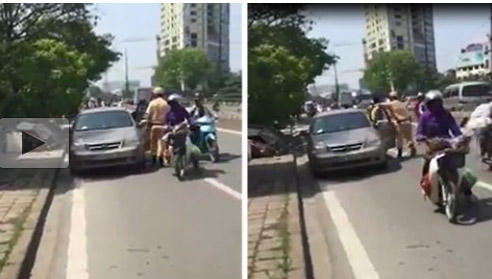 Clip: CSGT bất ngờ khống chế t&agrave;i xế giữa phố H&agrave; Nội