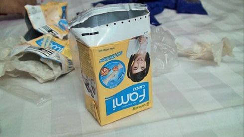 6.000 viên ma túy tổng hợp được hai đối tượng nguỵ trang trong 4 hộp sữa hiệu Fami.