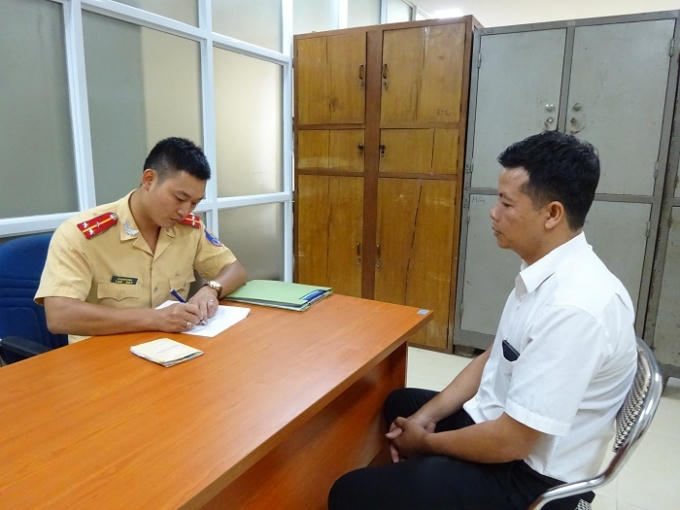 Tài xế Nguyễn Trọng Doãn tại cơ quan Công an.