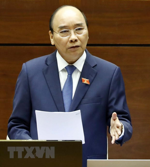 Thủ tướng Nguyễn Xuân Phúc trả lời chất vấn của đại biểu Quốc hội. (Ảnh: Thống Nhất/TTXVN)