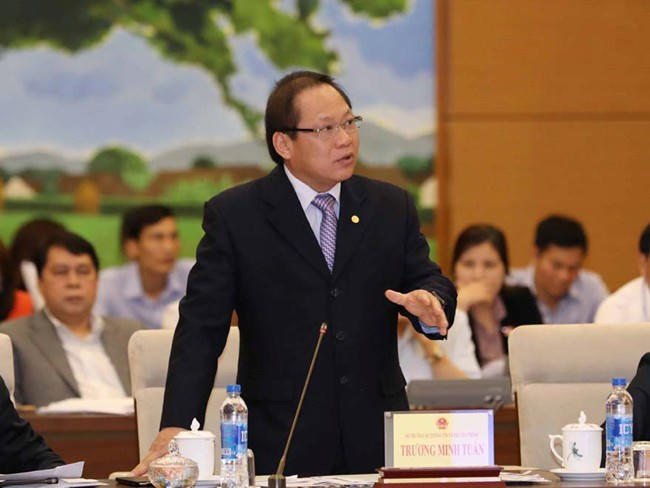 Bộ trưởng Trương Minh Tuấn trả lời tại phiên chất vấn. (Ảnh: TTXVN)