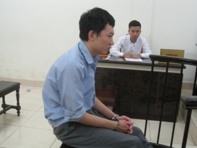 Zhang Ze Ming trước vành móng ngựa trong phiên tòa.