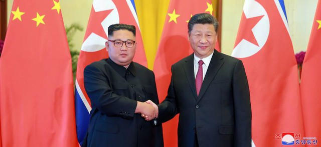 Nhà lãnh đạo Triều Tiên Kim Jong-un và Chủ tịch Trung Quốc Tập Cận Bình (Ảnh: KCNA)