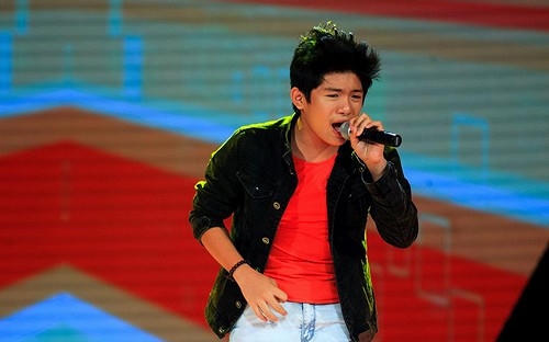 Đoàn Thế Lân những ngày đầu tiên tham gia Vòng giấu mặt The Voice Kids 2014.