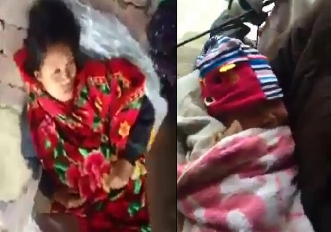 Mẹ con sản phụ may mắn được người dân giúp đỡ nên đã vượt cạn thành công. (Ảnh: cắt từ clip)