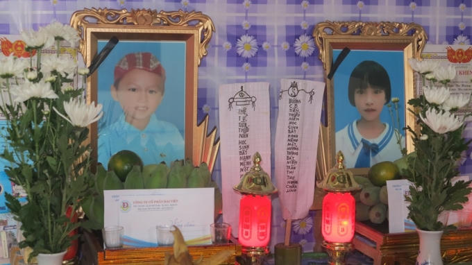 Di ảnh của hai anh em Trần Thành Trung (học sinh lớp 5 A), Trần Thu Hương (học sinh lớp 1 C) nạn nhân trong vụ đuối nước tại địa bàn xã Diễn Quảng, huyện Diễn Châu.