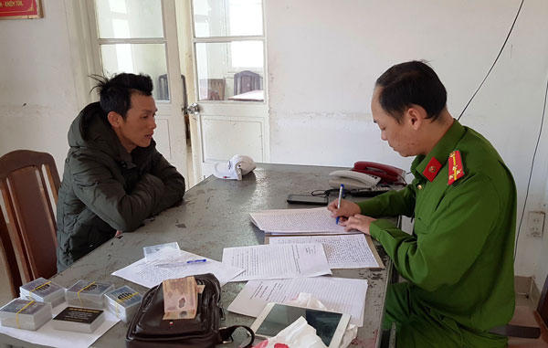 Cường tại cơ quan công an.