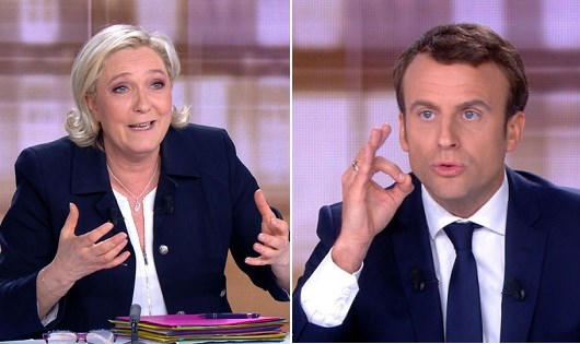 Đối thủ cực hữu Marine Le Pen và ứng cử viên độc lập Emmanuel Macron (phải).
