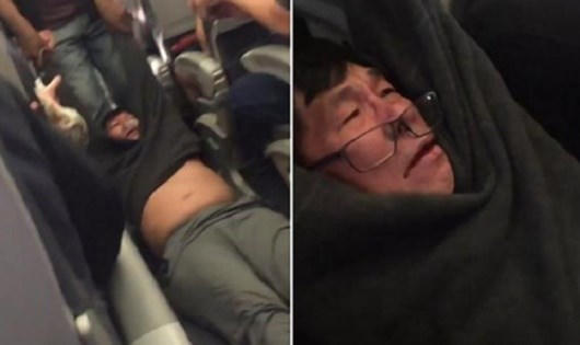 Hình ảnh bác sĩ Dao bị nhân viên hãng United Airlines kéo đi.