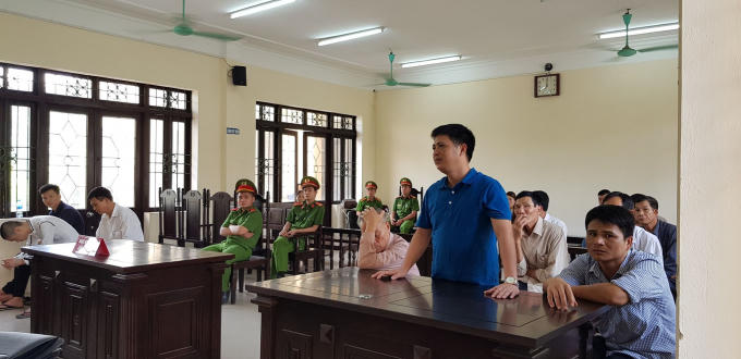 Ông Phạm Công Bình – cán bộ công an huyện Gia Bình tại phiên tòa.