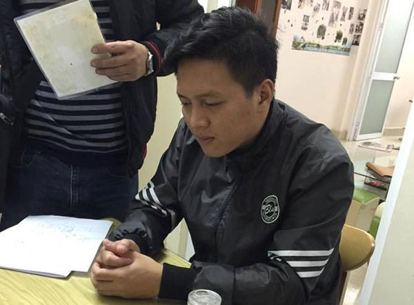 Trần Hoài Nam tại cơ quan công an.