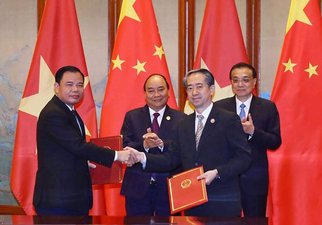 Hai Thủ tướng chứng kiến ký kết thoả thuận về nông nghiệp. (Ảnh: Quang Hiếu)