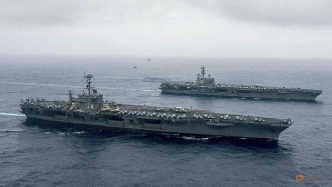 Hai tàu sân bay USS Ronald Reagan và USS John C Stennis của Hải quân Mỹ. (Ảnh: Reuters)