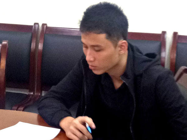 Phạm Thanh Tùng tại cơ quan công an.