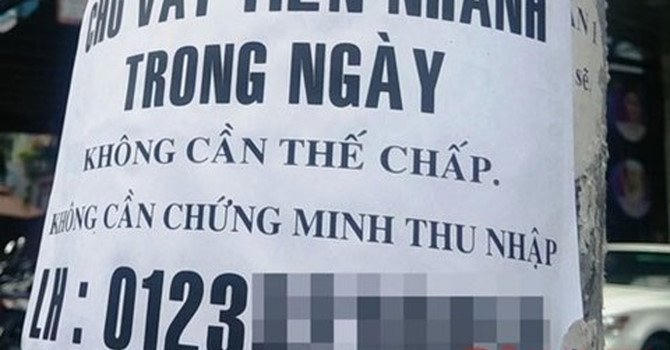 Quảng cáo cho vay nặng lãi nhan nhãn khắp nơi.
