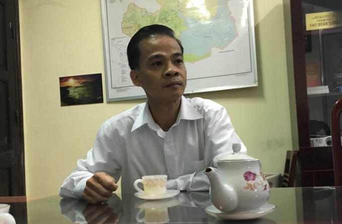 Ông Cao Xuân Tường, Giám đốc Chi nhánh Văn phòng đăng ký đất đai TP Điện Biên Phủ trao đổi với phóng viên.