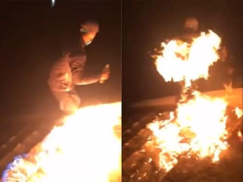 H&igrave;nh ảnh ghi lại cảnh N.T tự thi&ecirc;u, nhảy s&ocirc;ng được d&acirc;n mạng chia sẻ.