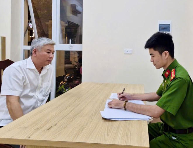 Nguyễn Ngọc Ngân tại cơ quan công an. Ảnh Công an Hà Nội