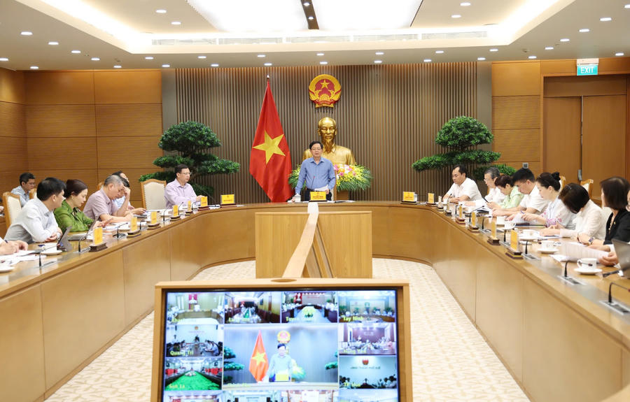 Phó Thủ tướng Hồ Quốc Dũng chủ trì cuộc họp về tình hình quản lý vùng trồng, cơ sở đóng gói và công tác kiểm nghiệm nông sản xuất khẩu - Ảnh: VGP