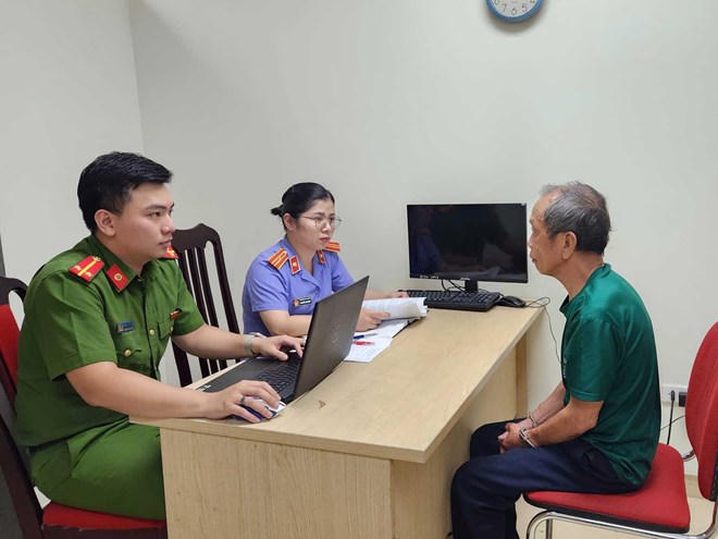 Đối tượng Nguyễn Tiến Nam tại cơ quan Công an. Ảnh CA TP Hà Nội Đối tượng Nguyễn Tiến Nam tại cơ quan Công an. Ảnh CA TP Hà Nội