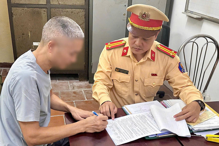 Ông T. làm việc tại cơ quan công an. Ảnh: CACC