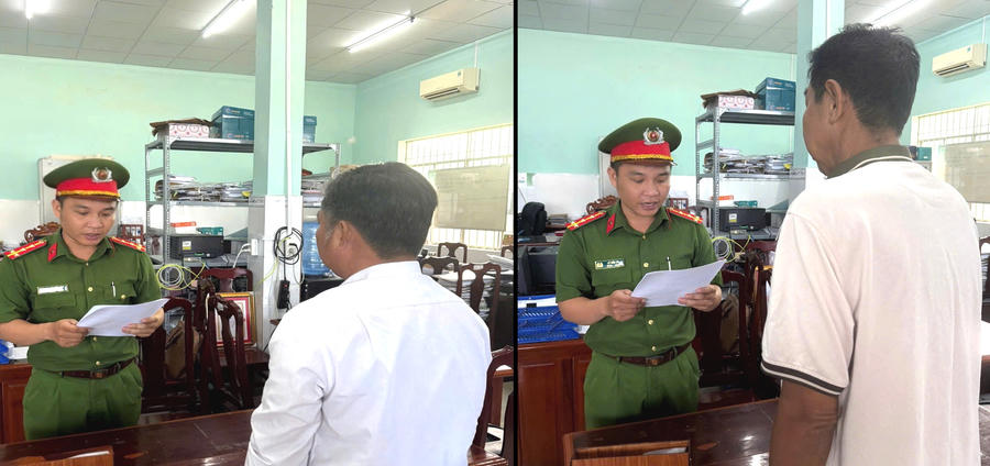 Cơ quan điều tra tống đạt các quyết định khởi tố bị can và áp dụng biện pháp cấm đi khỏi nơi cư trú đối với Nguyễn Huy Cường, Danh Ngân. (Ảnh: Công an tỉnh An Giang)