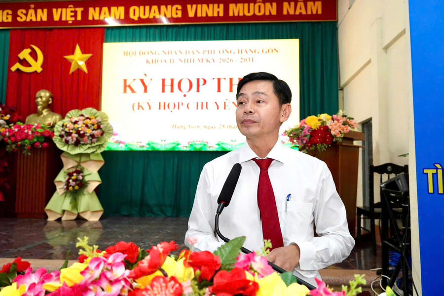 Đại biểu trình bày báo cáo.