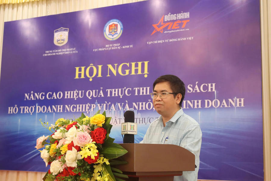 Ông Cao Đăng Vinh, Phó Cục trưởng Cục Pháp luật dân sự - kinh tế (Bộ Tư pháp) phát biểu khai mạc.