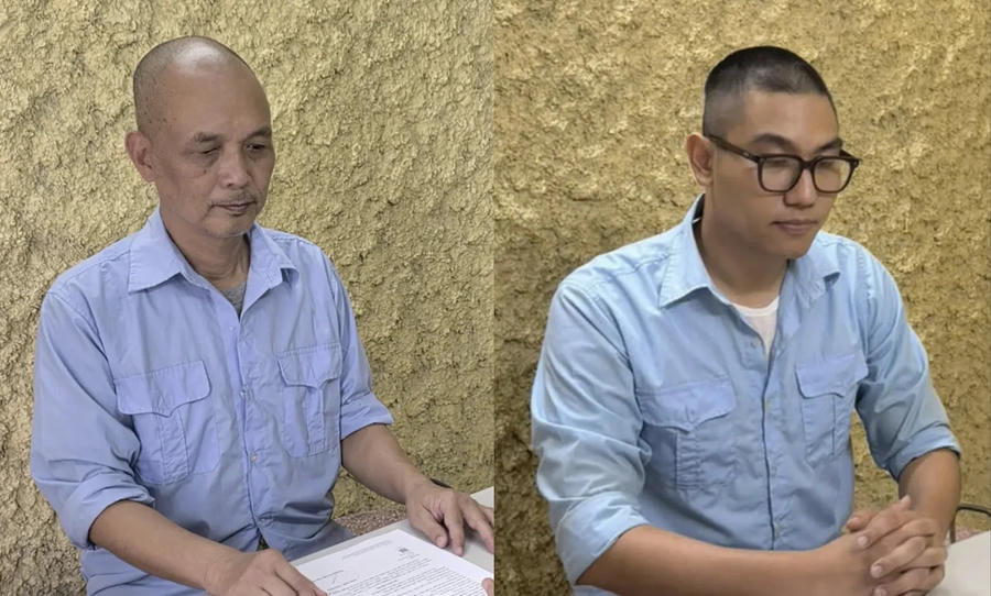 Nguyễn Thành Nam (trái) cùng Trần Việt Anh tại cơ quan Công an. Ảnh: CACC.