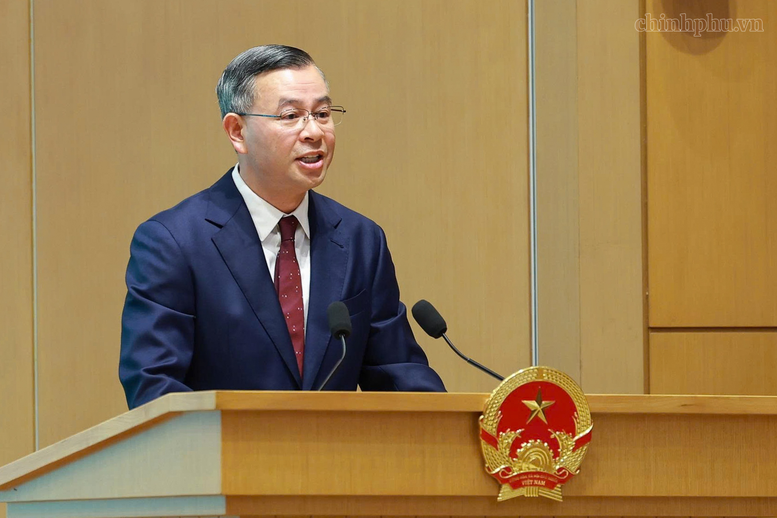 Bộ trưởng Bộ Tài chính Ngô Văn Tuấn trình bày Báo cáo trung tâm của Hội nghị. (Ảnh: VGP/Nhật Bắc)