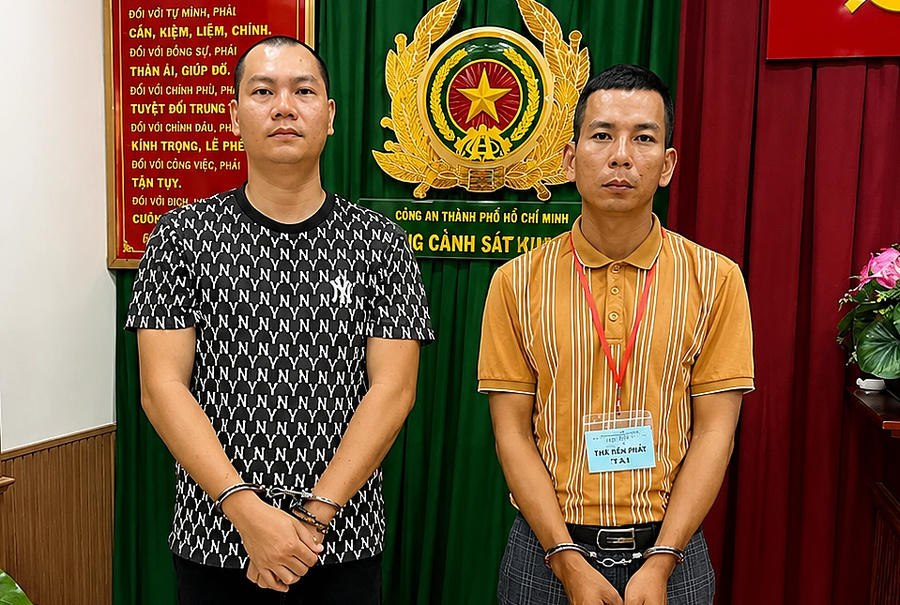 Bị can Ngô Sĩ Linh (bìa phải) và Nguyễn Hoài Nghĩa. Ảnh: Công an cung cấp.