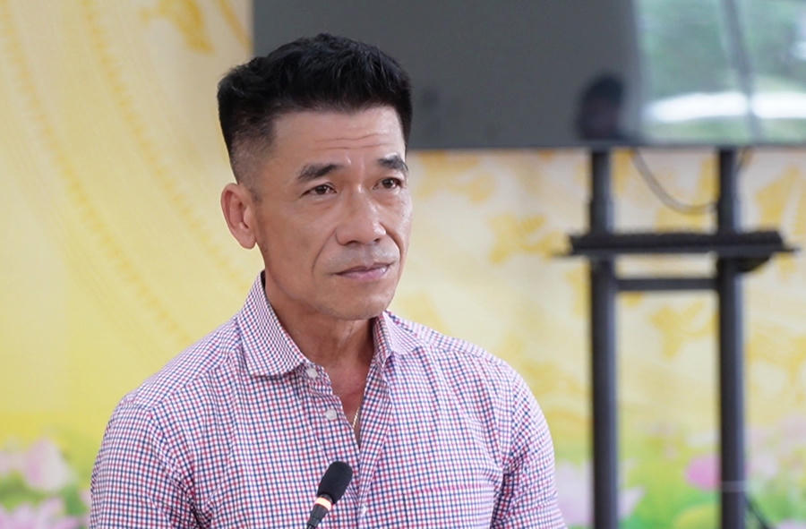Ông Nguyễn Minh Trung Đức - Giám đốc Công ty TNHH Tập đoàn Nông nghiệp sạch hữu cơ Toàn Cầu, trình bày phương án thanh toán công nợ với các hợp tác xã.
