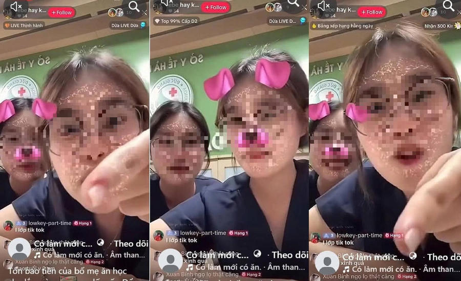 Hai nhân viên y tế ngồi tại quầy đón tiếp phát livestream chửi thề. Ảnh chụp màn hình Hai nhân viên y tế ngồi tại quầy đón tiếp phát livestream chửi thề. Ảnh chụp màn hình